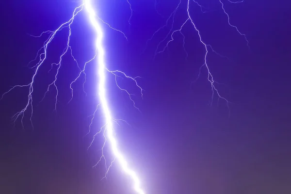 Dramatic thunder storm lighting bolt over the sky, god power
