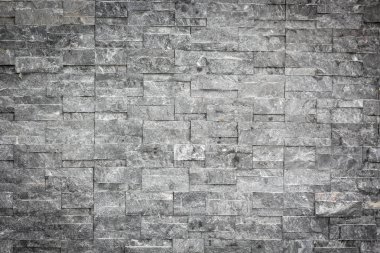 taş tuğla duvara bir arka plan doku olarak sopa.