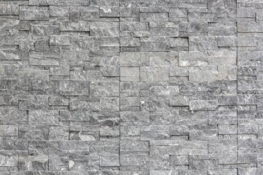 taş tuğla duvara bir arka plan doku olarak sopa.