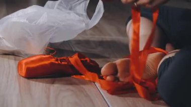 a man holds a package with a bag in his hands.