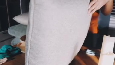 woman doing houseironing at home