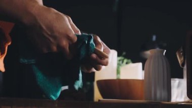 man in kitchen with a cup of coffee