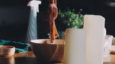 man pouring hot chocolate