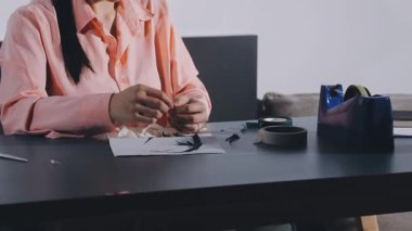 fashion designer working in the studio, original photoset