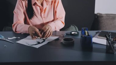 young asian female entrepreneur working on her laptop at home.