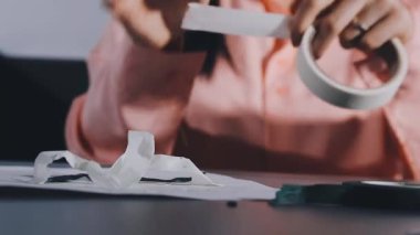 close - up of female tailor in workshop
