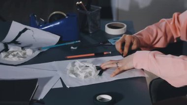 young woman working in office. female designer. fashion and creativity concept