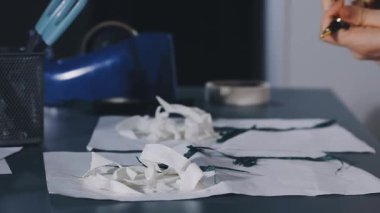 woman with a medical mask in the office.