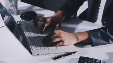 young businessman working in office, top view.