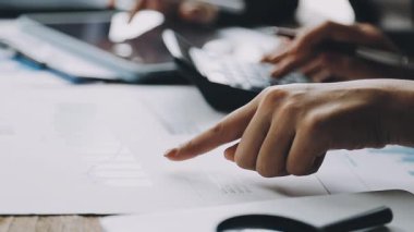 close up business team discussing financial data on computer