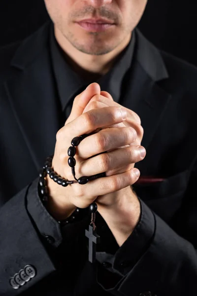 Christian person praying, low key image — Stock Photo, Image