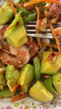 salad with avocado and crab sticks, thai food, thailand.
