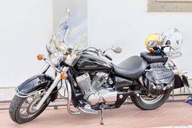 Rome, Italy - June 27, 2018: Beautifull custom motocycle Honda Shadow 750 parked on the seafront in Rome. Produced in Japan by Honda since 1988. clipart