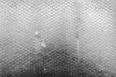 Altın nektarla dolu altıgen bal peteklerinden arı damlayan bal damlası, bal peteği yaz kompozisyonu doğal bal damlası, balmumu çerçeve arısına damlayan bal damlası, bal peteğine damlayan bal damlası