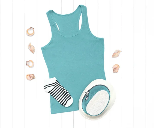 Mint tank top with seashells and a straw hat on a white background - mock up for your design