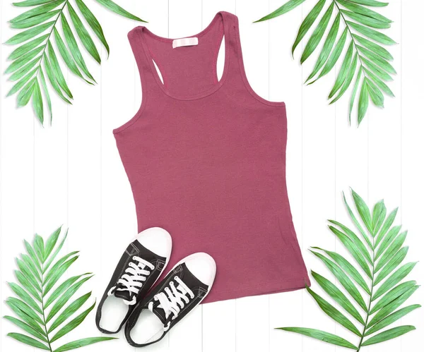 Cardinal red tank top with sneakers and palm leaves on a white background - tank top mockup for your design