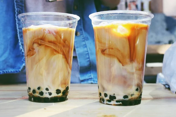 Two Plastic Cups Brown Bubble Tea Wooden Table Royalty Free Stock Photos