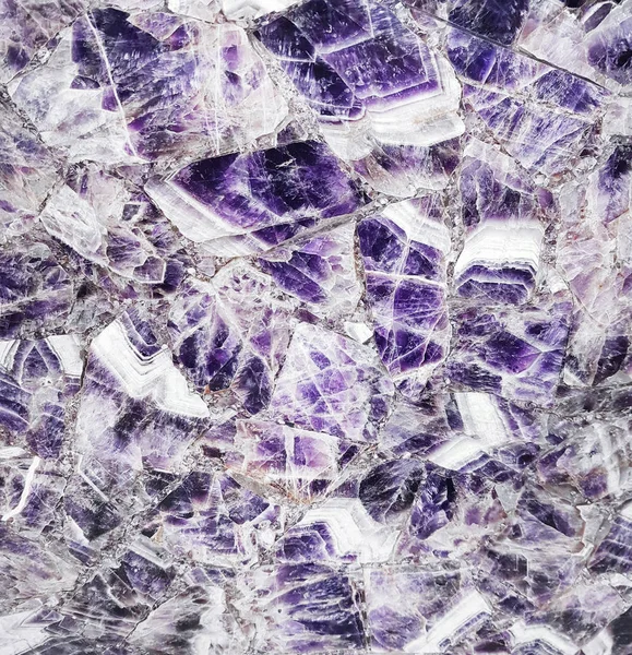 White and violet cracked marble stone texture