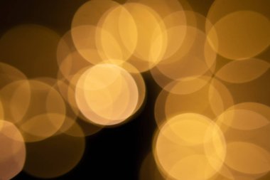 Led el feneri siyah bir zemin üzerine gelen bokeh
