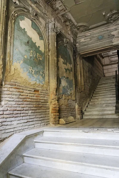 The ruined interior of the front door of the ancient building