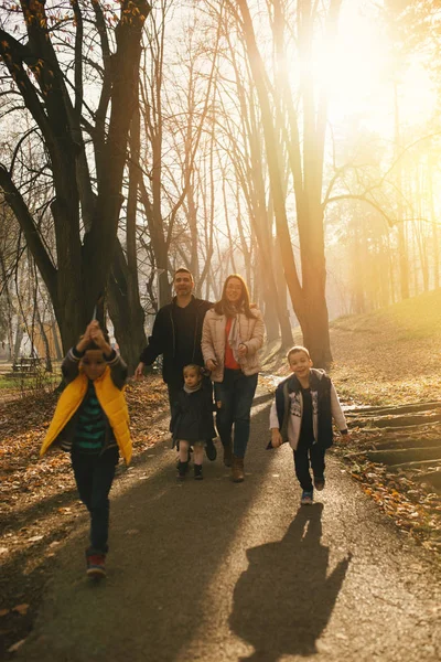 Happy Young Family Enjoying Beautiful Autumn Day Park Smiling Walking — Stock Photo, Image