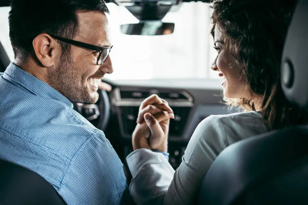 Happy Middle Age Couple Enjoying While Choosing Buying New Car — Stock Photo, Image