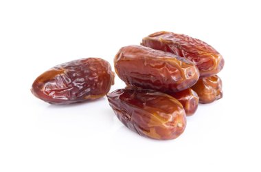 Beyaz siyah zeminde izole edilmiş hurma, sağlıklı yiyecek konsepti