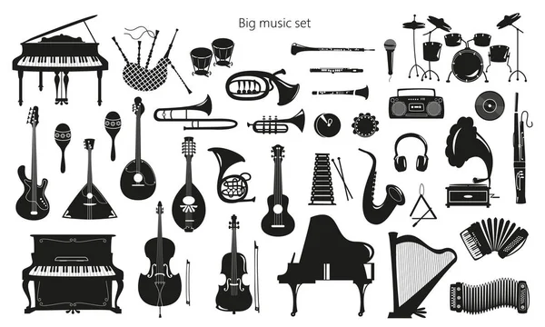 Conjunto de instrumentos musicales sobre fondo blanco . — Vector de stock