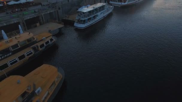 River port with boats in the old part of town at sunset aerial drone shoot — Stock Video