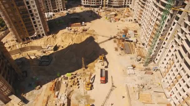 Aerial shoot of construction site with tower cranes. Drone footage — Stock Video