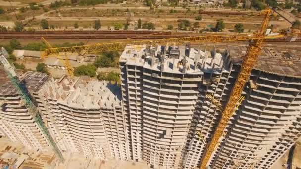 Aerial shoot of construction site with tower cranes. Drone footage — Stock Video