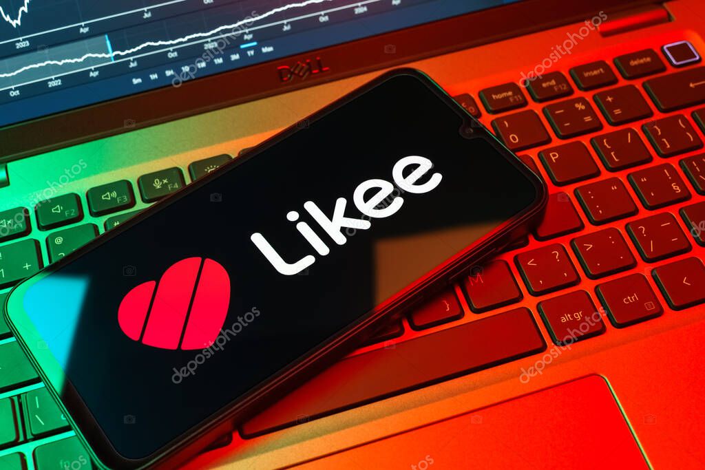 Prague, Czechia - 08 18 2025: A mobile phone on a keyboard displays Likee logo. Likee is a platform for creating and sharing short videos.