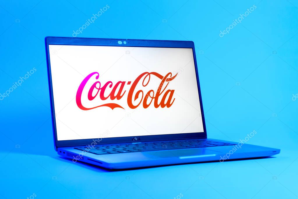 Prague, Czechia - 05 18 2025: A low-angle view of a laptop displaying Coca-Cola logo. Coca-Cola is a beverage company known for its soft drinks.