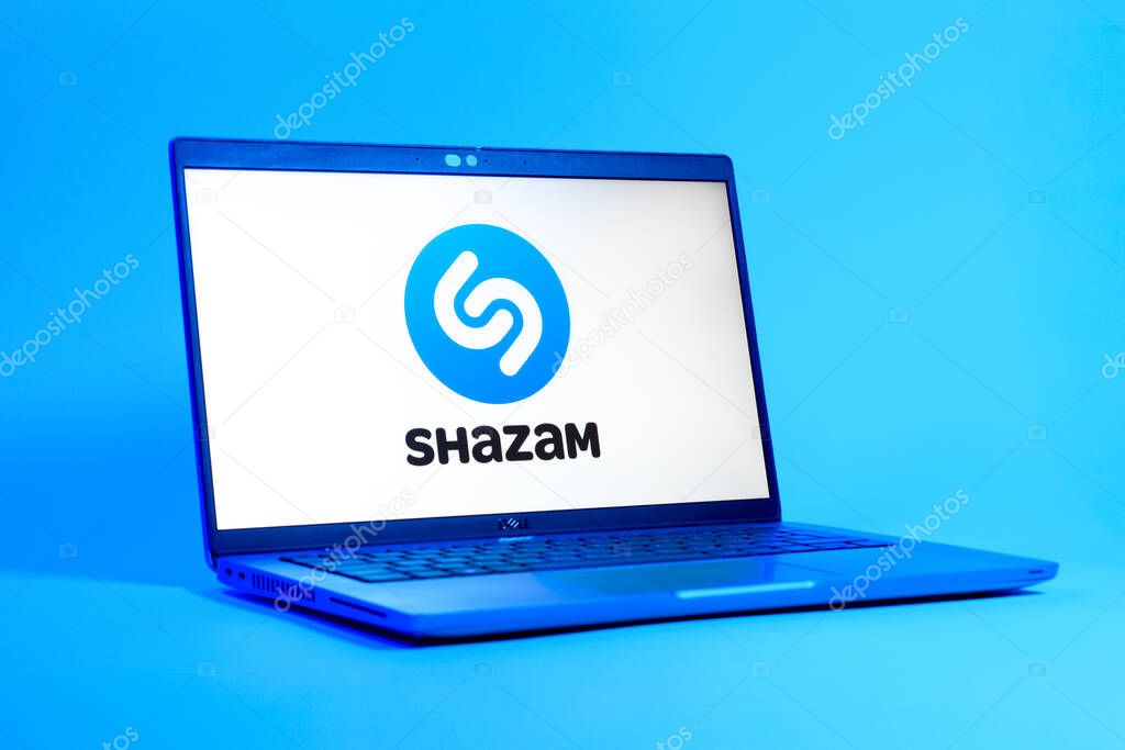Prague, Czechia - 05 18 2025: A low-angle view of a laptop displaying Shazam logo. Shazam is an app for identifying songs and music tracks.