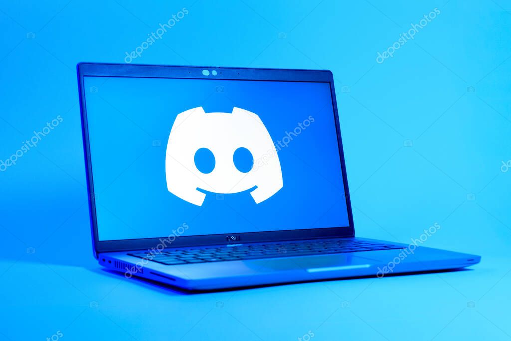 Prague, Czechia - 05 18 2025: A low-angle view of a laptop displaying Discord logo. Discord is a platform for voice, video, and text communication.