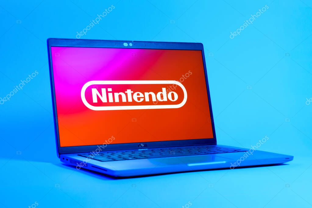Prague, Czechia - 05 18 2025: A low-angle view of a laptop displaying Nintendo logo. Nintendo is a company producing video game consoles and games.