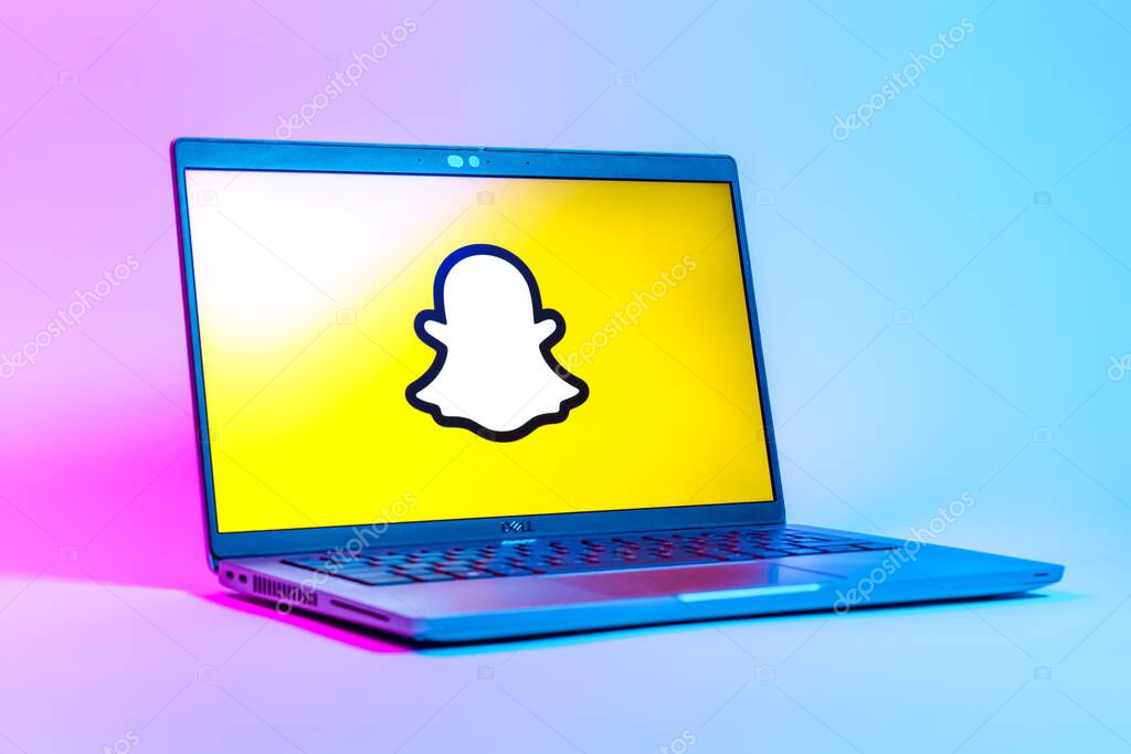 Prague, Czechia - 05 18 2025: A low-angle view of a laptop displaying Snapchat logo. Snapchat is an app for sending photos, videos, and temporary messages.