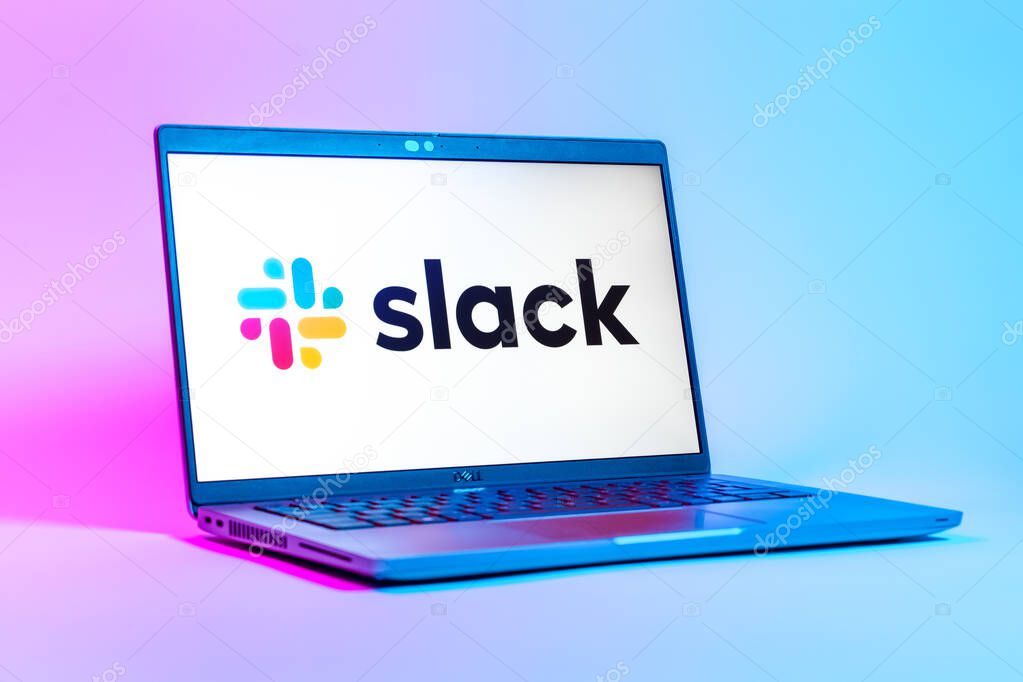 Prague, Czechia - 05 18 2025: A low-angle view of a laptop displaying Slack logo. Slack is a platform for team messaging and workplace communication.