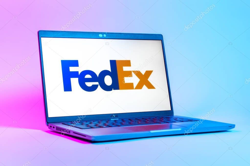 Prague, Czechia - 05 18 2025: A low-angle view of a laptop displaying FedEX logo. FedEX is a logistics company providing shipping and courier services.