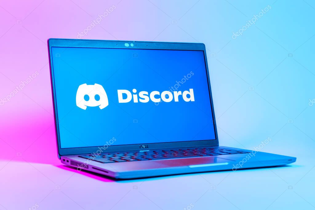 Prague, Czechia - 05 18 2025: A low-angle view of a laptop displaying Discord logo. Discord is a platform for voice, video, and text communication.