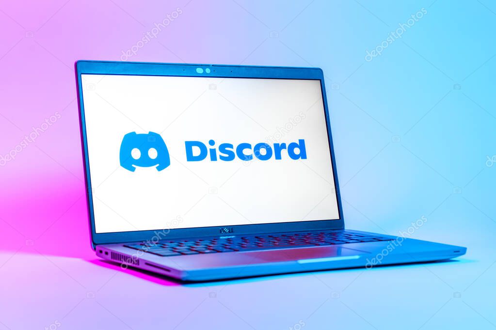Prague, Czechia - 05 18 2025: A low-angle view of a laptop displaying Discord logo. Discord is a platform for voice, video, and text communication.