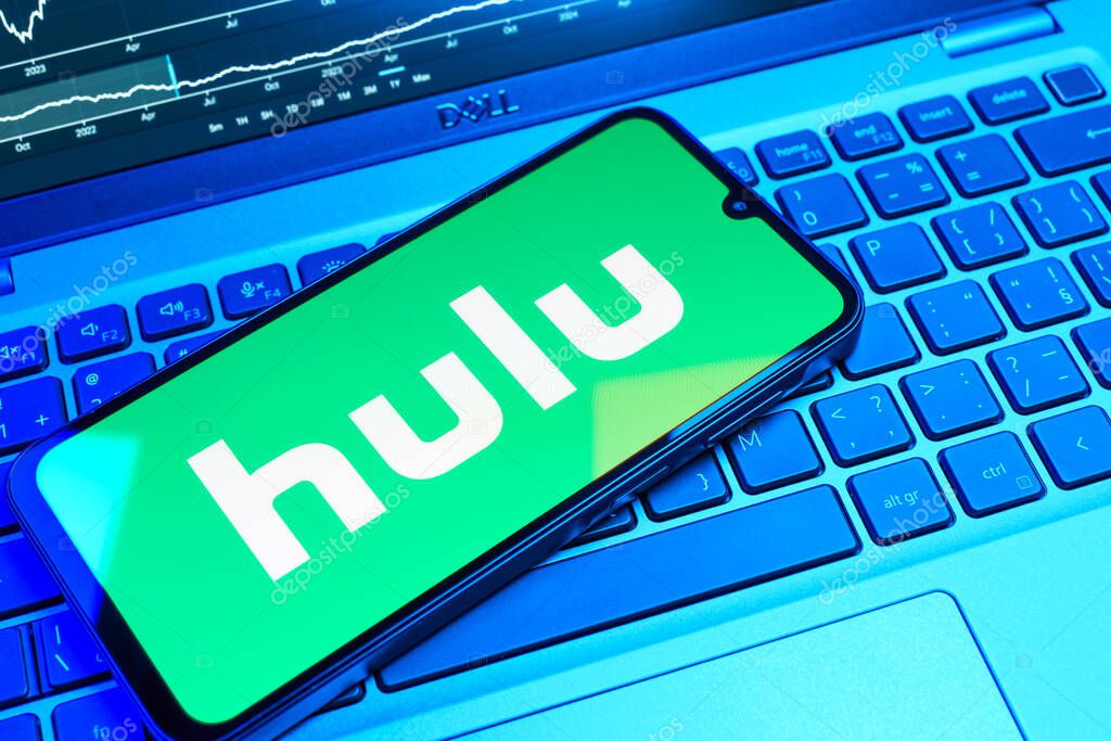 Prague, Czechia - 08 18 2025: A mobile phone on a keyboard displays Hulu logo. Hulu is a streaming platform for TV shows, movies, and live TV.