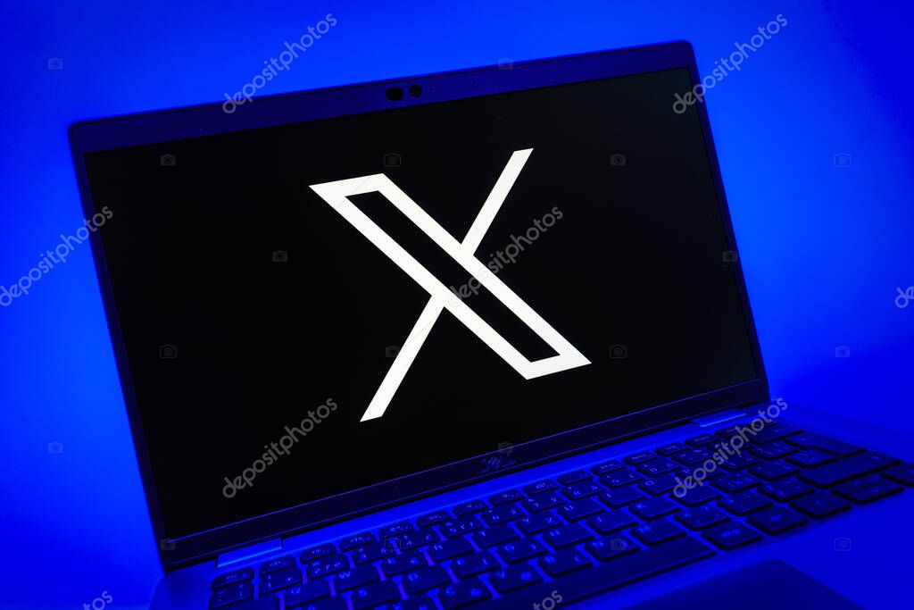 Prague, Czechia - 08 01 2025: A close-up view of a laptop screen displaying the X logo. X is a platform for sharing short posts and updates.