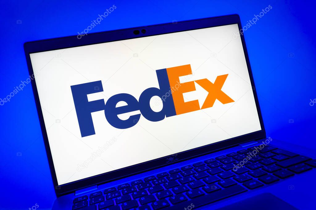 Prague, Czechia - 08 01 2025: A close-up view of a laptop screen displaying the FedEX logo. FedEX is a logistics company providing shipping and courier services.
