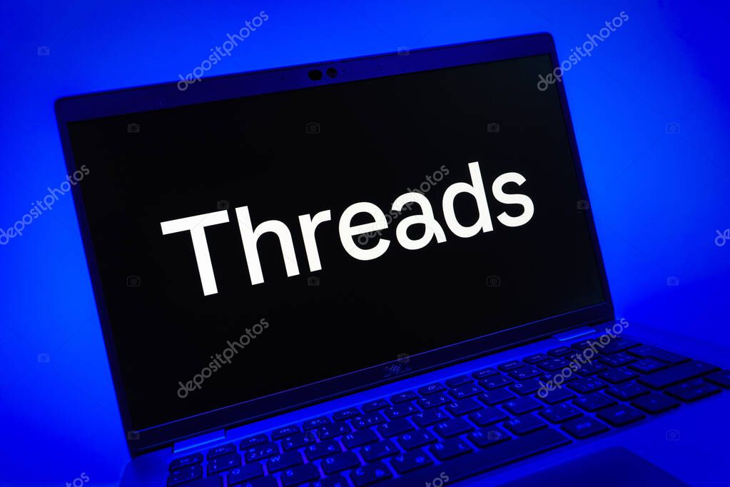 Prague, Czechia - 08 01 2025: A close-up view of a laptop screen displaying the Threads logo. Threads is a social media platform for sharing short posts and updates.