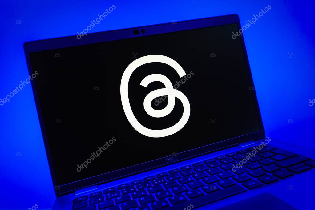 Prague, Czechia - 08 01 2025: A close-up view of a laptop screen displaying the Threads logo. Threads is a social media platform for sharing short posts and updates.