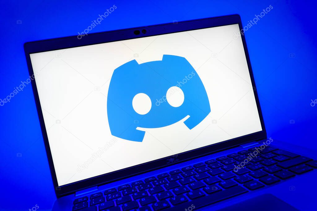 Prague, Czechia - 08 01 2025: A close-up view of a laptop screen displaying the Discord logo. Discord is a platform for voice, video, and text communication.