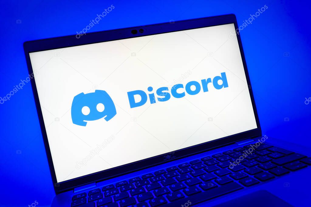 Prague, Czechia - 08 01 2025: A close-up view of a laptop screen displaying the Discord logo. Discord is a platform for voice, video, and text communication.