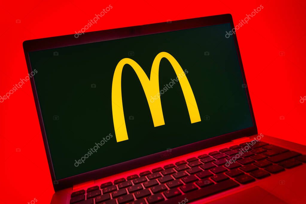 Prague, Czechia - 08 01 2025: A close-up view of a laptop screen displaying the McDonalds logo. McDonalds is a fast-food chain serving burgers, fries, and more.