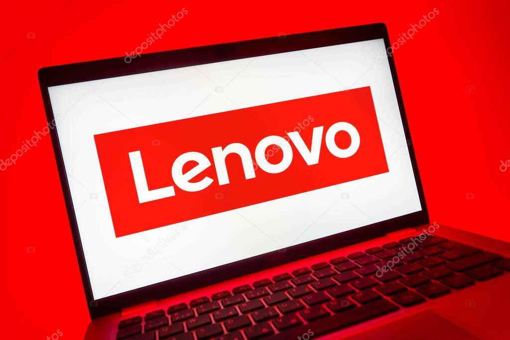Prague, Czechia - 08 01 2025: A close-up view of a laptop screen displaying the Lenovo logo. Lenovo is a technology company producing computers and electronics.